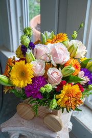 New Baby Flowers in a wooden carriage