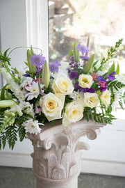 Dining table centrepiece of seasonal flowers