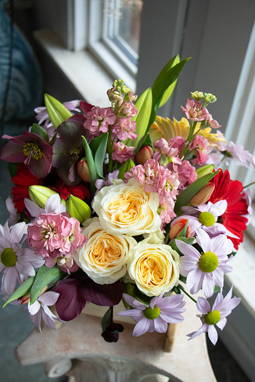 New Baby Flowers in a wooden carriage