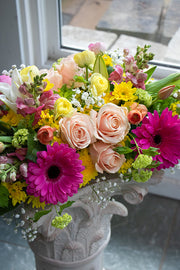 Dining table centrepiece of seasonal flowers