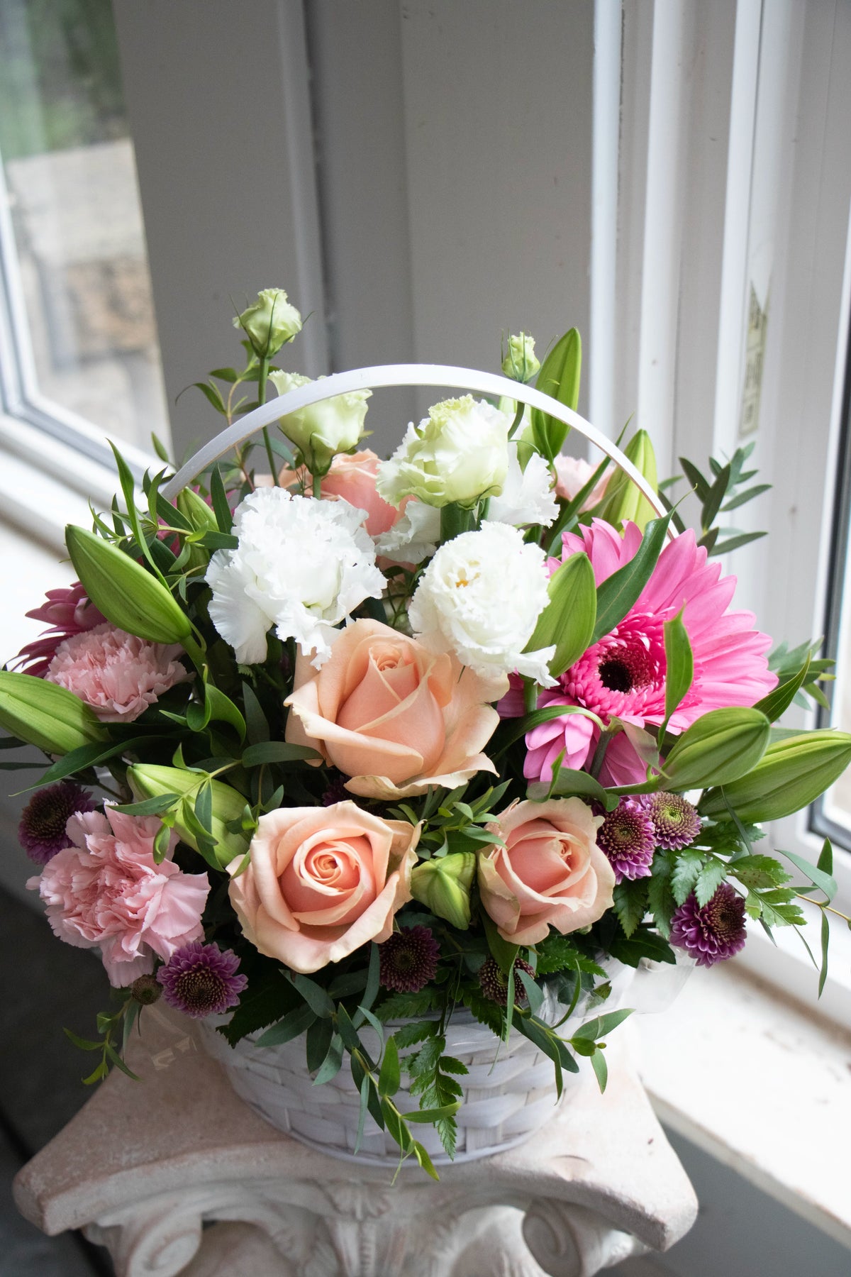 Sympathy Floral Basket in pastel colours, standard size